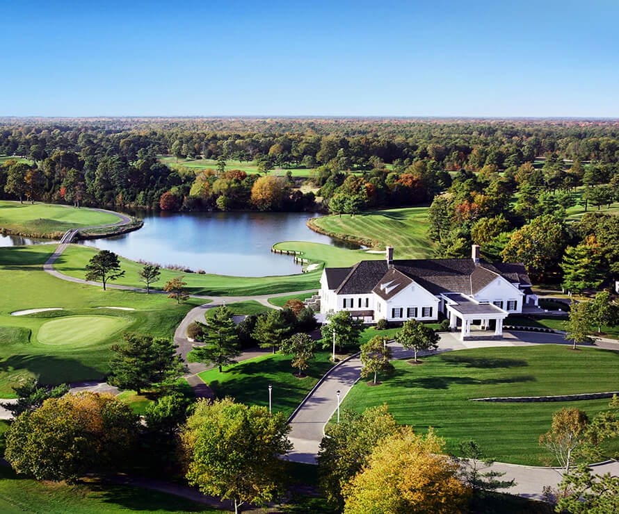 clubhouse and waterway and surrounding greens